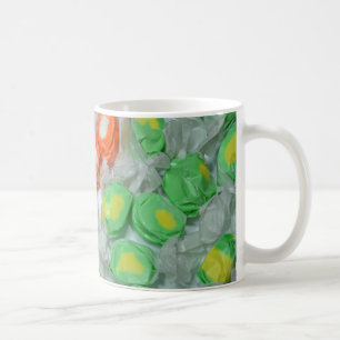 Green and orange taffy candy coffee mug