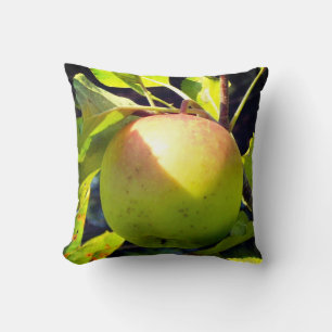 Green and pink apple throw pillow