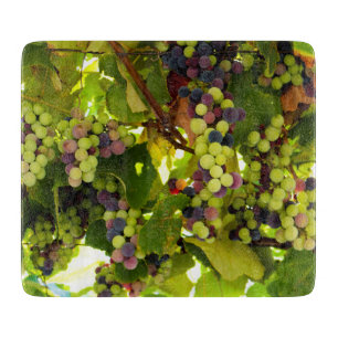 Green and Purple Grapes Growing on the Vine Cutting Board