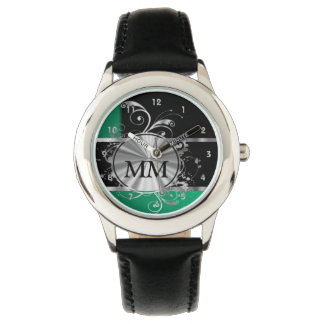 Green and silver monogram on black watch