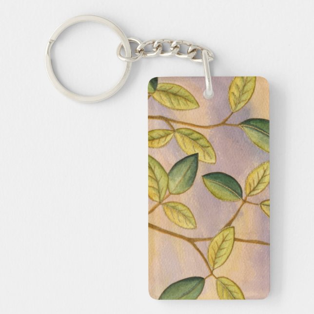 Green and Yellow Leaves on Sunset Background Keychain (Front)