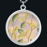 Green and Yellow Leaves on Sunset Background Silver Plated Necklace<br><div class="desc">The purple and gold of a sunset background is the perfect contrast to the yellow and green leaves that are the focus of this piece by Megan Meagher. You can almost hear the wind sing as it gently caresses the leaves.</div>