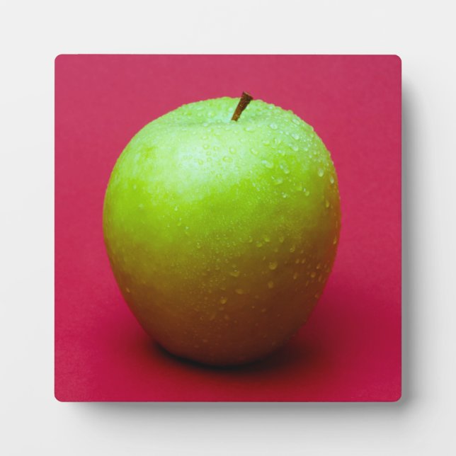 Green apple on red background plaque (Front)