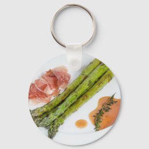Green asparagus with ham and sauce keychain