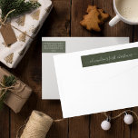 Green Babys First Christmas Return Address Wrap Around Label<br><div class="desc">A simple modern holiday wrap around return address label featuring first christmas in white script typography on a dark green background. Personalize with your babys name. Add this special detail to your holiday mailings.</div>