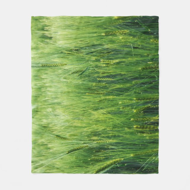 Green barley field, spring closeup. fleece blanket (Front)