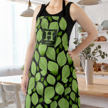 Green Basil Herb Leaf Pattern Botanical Monogram Apron<br><div class="desc">Green Basil Herb Leaf Pattern Botanical Name and Monogram Apron. Green basil leaves in a pattern on a black background. Add your name and monogram.</div>