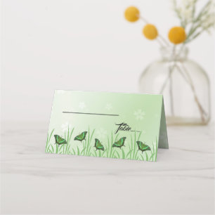 Green butterfly on light green - wedding place card
