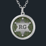 Green Camouflage Pattern Sheriff Badge Monogram Silver Plated Necklace<br><div class="desc">This customizable camo pattern design has a metal sheriff badge with space for you to add your monogram / initials or other text. The camouflage is in shades of green and brown. It's a great design for a person in the military, a veteran, a woman or man in law enforcement,...</div>