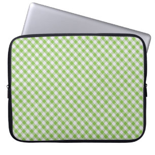 Green chequered fabric: closeup texture. laptop sleeve
