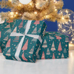Green Christmas Trees Snowflakes Green Christmas Wrapping Paper<br><div class="desc">Elevate your holiday gift-giving with our Super Cute Green Christmas Wrapping Paper. This modern and festive wrapping paper is designed to capture the essence of the holiday season in a delightful and charming manner. The wrapping paper features a vibrant green background that sets the stage for a winter wonderland. Adorning...</div>