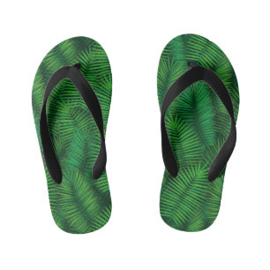 Green coloured palm tree leaf pattern. kid's flip flops