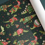 Green Cute Dinosaurs Christmas Sweaters Wrapping Paper<br><div class="desc">Celebrate the holidays with this Cute Dinosaurs Christmas Sweaters design. This Cute Christmas Wrapping Paper features various dinosaurs wearing festive Christmas ugly sweaters. You can customize this further by clicking on the "PERSONALIZE" button. Change the background colour if you like.</div>