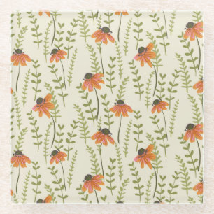 Green ferns, orange flowers, nature. glass coaster