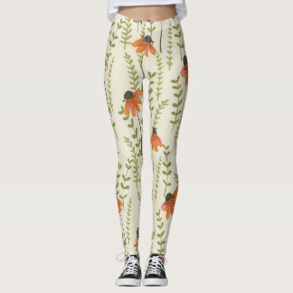 Green ferns, orange flowers, nature. leggings