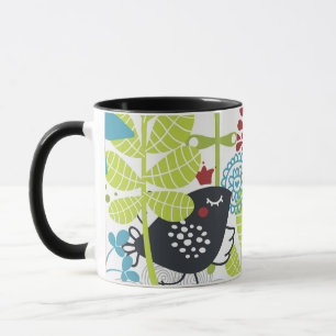 green florest and balck bird Mug