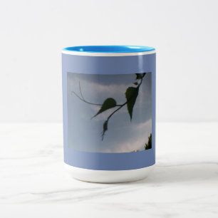 Green Foliage in Cloudy Blue Sky Two-Tone Coffee Mug