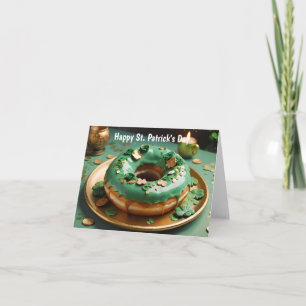 Green glazed doughnut decorated with 4 leaf clover card