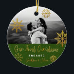 Green Gold Snowflakes First Christmas Engaged Ceramic Ornament<br><div class="desc">Bright Christmas holiday photo ornament with gold snowflakes and bright green background for engaged couple. Personalize it by adding your names. It's a good gift for newly weds or for a fiance/fiiancee.</div>