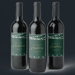 Green & Gold String Lights Snow Merry Christmas Wine Label<br><div class="desc">Celebrate the season with this stylish custom Christmas wine label. This label design features "Merry Christmas" text and a festive snowflake and string lights background. You can personalize the text. More holiday stationery and party supplies are available at my shop BaraBomDesign.</div>