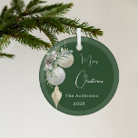 Green gold white baubles Christmas Glass Ornament<br><div class="desc">A green coloured background. Decorated with white and gold baubles and some greenery and a pine cone.  Personalize and add your name,  year.  Text: Merry Christmas</div>