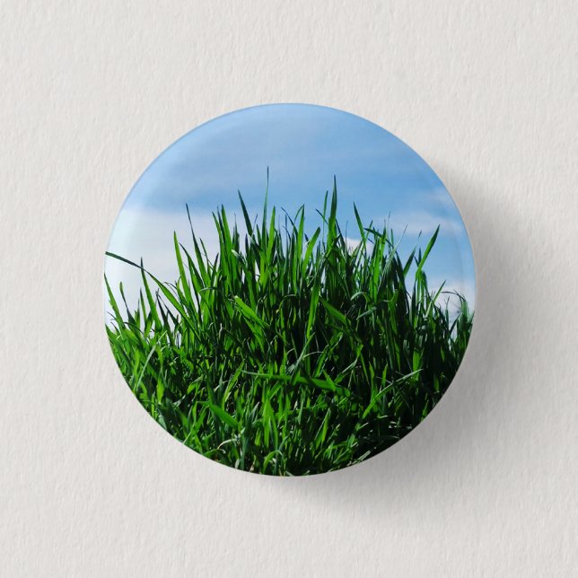 Green grass against the background of the endless  1 inch round button (Front)