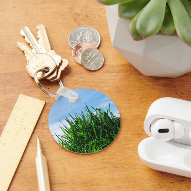 Green grass against the background of the endless  keychain (Desk)