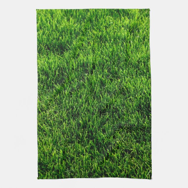 Green grass texture from a soccer field kitchen towel (Vertical)