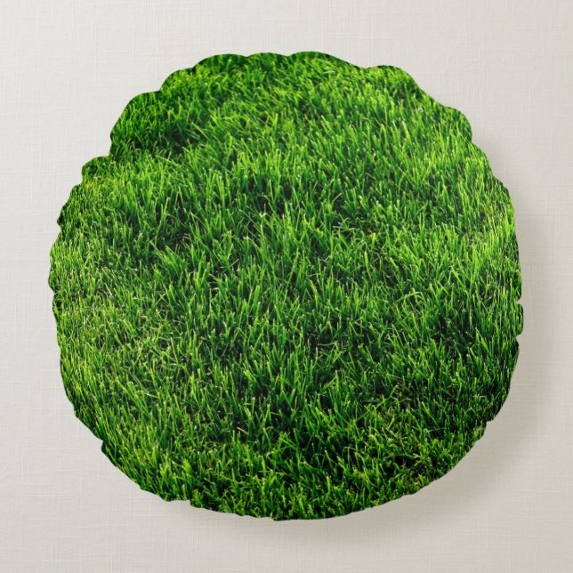 Green grass texture from a soccer field round pillow (Front)