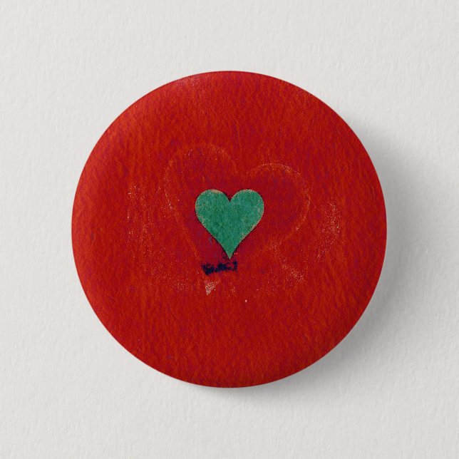Green heart on a red grunge background 2 inch round button (Front)