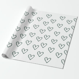 green heart on white wrapping sheet   paper