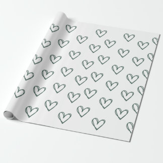 green heart on white wrapping sheet   wrapping paper