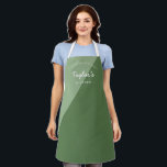 Green Homemade with Love Personalized Kitchen Apron<br><div class="desc">Let's get baking, cooking and creating. Customize the name on this two-tone Green apron personalized apron. Seen here in with white typography in a stylish layout design. Encourage the chef in your life, a small business bakery owner, an aspiring culinary genius with a special gift. Perfect for baking those yummy...</div>