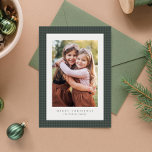 Green houndstooth frame classic Christmas photo Holiday Card<br><div class="desc">A festive and classic green on green houndstooth pattern frames a single vertical photo on this classic holiday card. The simple type allows room for a custom greeting ("Merry Christmas" can be changed to "Happy Holidays" or anything you'd like), family name and year. The back features a coordinating checked houndstooth...</div>