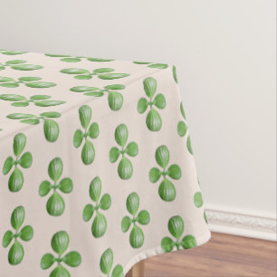 Green Jade Tree Leaves on Light Beige Tablecloth