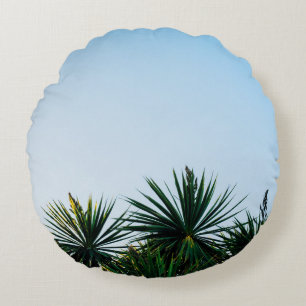 Green leaf plants under clear sky round pillow