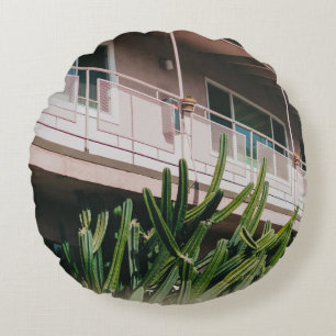 GREEN LEAFED PLANT NEAR BUILDING ROUND PILLOW