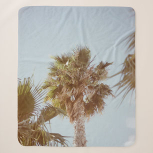 Green-leafed tree in the morning sherpa blanket