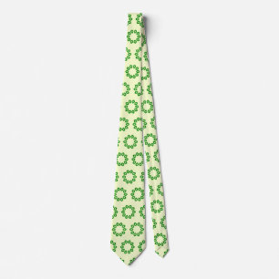 Green leaves in a circle on yellow tie