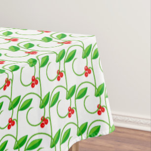Green Leaves with Little Red Wild Berries on White Tablecloth