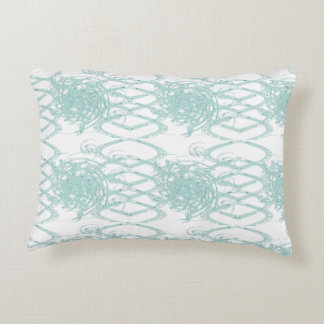 Green light design on white accent pillow