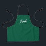 Green Little Chef Script Name personalized Kids Apron<br><div class="desc">Make your little chef feel extra special with our Green Little Chef Script Name Personalized Kids Apron. This apron is designed to provide a simple, chic, and elegant look, featuring stylish script typography for personalizing the name. The purple background colour adds a touch of vibrancy and fun, perfect for engaging...</div>