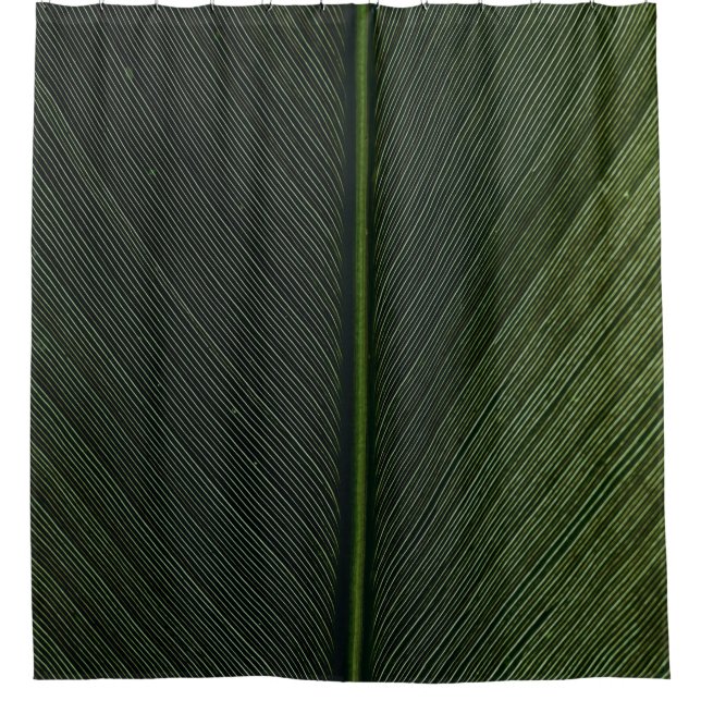 Green metal rod on black and white pinstripe texti (Front)