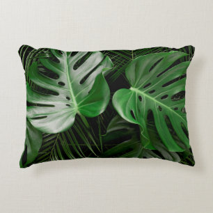 Green monstera leaves and palm leaves accent pillow