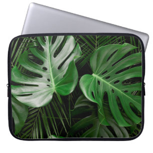 Green monstera leaves and palm leaves laptop sleeve