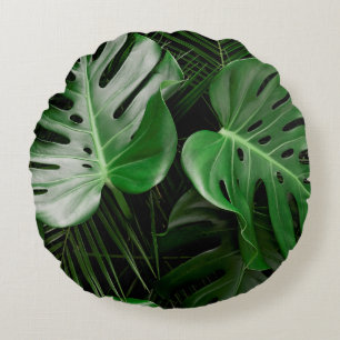 Green monstera leaves and palm leaves round pillow