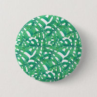 Green monstera tropical leaves pattern on white b
