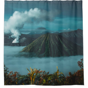 GREEN MOUNTAINS SURROUNDED BY WHITE CLOUDS