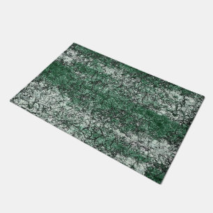 Green oil texture upon sticks and lint doormat