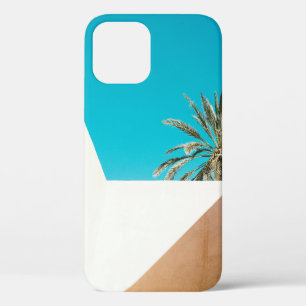 Green palm tree under blue sky in the morning iPhone 12 case